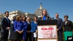 Erin Miller, granddaughter of World War Two veteran Women Airforce Service Pilots (WASP) Elaine Harmon, speaks during an event on Capitol Hill in Washington, March 16, 2016. Miller was instrumental in getting a bill passed to allow WASPs to be buried in A