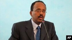 FILE - Then-Somali Prime Minister Mohamed Abdullahi Farmajo addresses officials after his swearing in ceremony at the Presidential residence in Mogadishu, Somalia. 