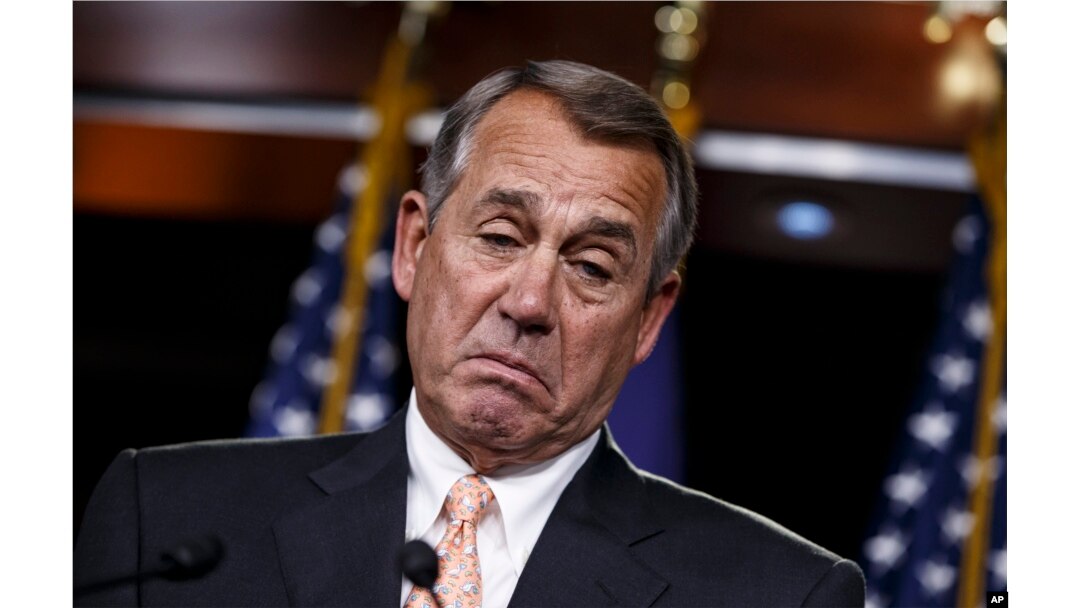 FILE - House Speaker John Boehner reacts to last week's impasse on Homeland Security funding. On Tuesday, the House approved a bill without provisions.