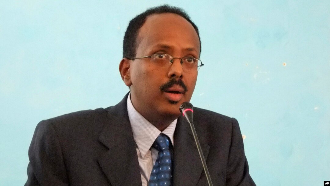 FILE - Then-Somali Prime Minister Mohamed Abdullahi Farmajo addresses officials after his swearing in ceremony at the Presidential residence in Mogadishu, Somalia. 