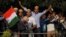 Indian cricket fans line up to get inside the Chinnaswamy Stadium, the venue of first Twenty20 cricket match between India and Pakistan, in Bangalore, India, December 25, 2012. 