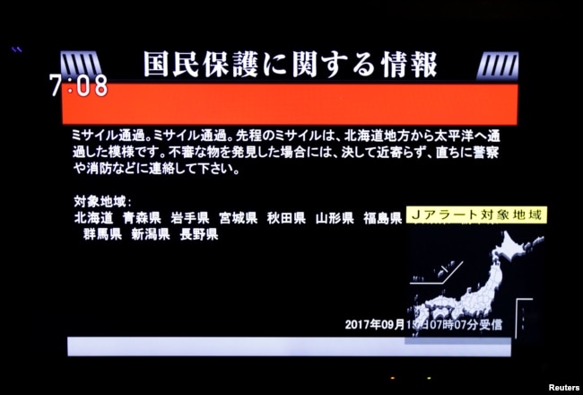 The Japanese government's alert message, called a J-alert, notifying citizens of a ballistic missile launch by North Korea is seen on a television screen in Tokyo, Sept. 15, 2017.