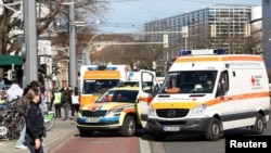 Ambulance vehicles are parked near the scene after a car drove into a crowd, in Mannheim, Germany, March 3, 2025.