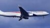China Rilis Foto yang Mungkin Bagian Pesawat Malaysia