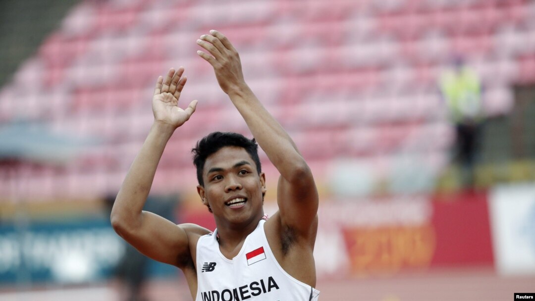 Lalu Muhammad Zohri merayakan kemenangan di kejuaraan lari putra 100 meter di IAAF World U20 Championship 2018 di Tampere, Finlandia, 11 Juli 2018.