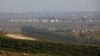 A picture taken from the Israeli-annexed Golan Heights Feb. 4, 2021, shows the border fence with the Syrian governorate of Quneitra.