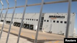 FILE - The Amazon warehouse in San Fernando de Henares is seen during a 3-day walkout to demand better wages and working conditions, on the outskirts of Madrid, Spain, July 17, 2018.
