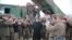 North Korean leader Kim Jong Un, center, guides the test fire of a new multiple launch rocket system in this undated photo released by North Korea's Korean Central News Agency (KCNA) in Pyongyang, March 4, 2016. 