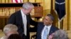 FILE - President Barack Obama greets the Rev. Joel Hunter, senior pastor of Northland, A Church Distributed, in Longwood, Fla., during the Easter Prayer Breakfast in the East Room of the White House in Washington. 