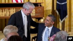 FILE - President Barack Obama greets the Rev. Joel Hunter, senior pastor of Northland, A Church Distributed, during the Easter Prayer Breakfast in the East Room of the White House in Washington. 