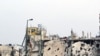 Syrian Activists: Women, Children Massacred in Homs 