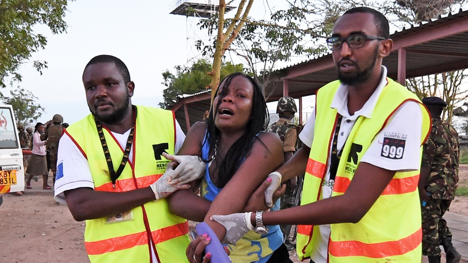 FILE - Paramedics help a student who was injured during an attack by Somalia's al-Qaida-linked al-Shabab gunmen at Garissa University College, Kenya, April 2, 2015. 