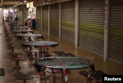 Stalls are shuttered at Hong Lim Hawker Centre in Singapore, May 10, 2020, amid the coronavirus outbreak. COVID-19 cases in Singapore recently spiked to 700 to 800 per day.