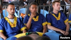 Benjamin Zalman Polun, Marcel Malanga and Tyler Thompson, American citizens suspected to be involved in an attempted coup in Congo, wait for the final verdict during their trial in Kinshasa, Democratic Republic of Congo, Sept. 13, 2024