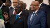 President Robert Mugabe and South African president Jacob Zuma, whose country has just sold some Zimbabwe property.