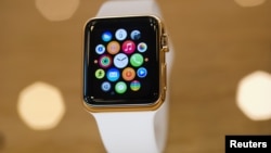A gold plated Apple Watch is seen at an Apple Store.