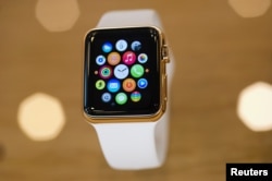 A gold plated Apple Watch is seen at an Apple Store in Berlin, April 10, 2015.