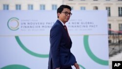 FILE - Andry Nirina Rajoelina, President of Madagascar, arrives for the closing session of the New Global Financial Pact Summit, Friday, June 23, 2023 in Paris. 