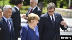 Germany's Chancellor Angela Merkel, Kosovo's President Hashim Thaci and Serbian President Aleksandar Vucic at the EU-Western Balkans Summit in Sofia, Bulgaria, May 17, 2018.