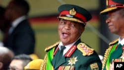 Army General Constantino Chiwenga smiles during the presidential inauguration ceremony in Harare, Zimbabwe, Nov. 24, 2017.