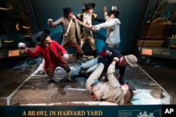 Photo depicts George Washington, center, braking up a fight amongst American soldiers including an African American man, lower right, who served in a New England regiment, at the Museum of the American Revolution