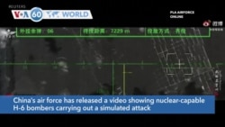 VOA60 Addunyaa - China released a video showing nuclear-capable H-6 bombers simulating an attack on Guam