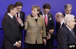 Merkel Çin rəsmiləri ilə İran problemi və iqtisadi məsələləri müzakirə edir (audio)