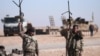 Битва за Ракку столкнула поддерживаемых США курдов с сирийскими проправительственными силами 