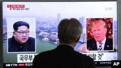 A man watches a TV screen showing file footage of U.S. President Donald Trump, right, and North Korean leader Kim Jong Un during a news program at the Seoul Railway Station in Seoul, South Korea, May 16, 2018. (AP Photo/Ahn Young-joon)