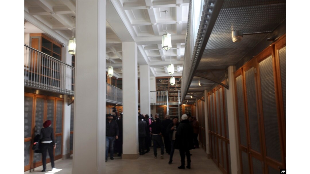 Officials walk around the main hall of the newly opened Saint Catherine library in South Sinai, Egypt, Dec. 16, 2017. The inauguration ceremony comes after three years of restoration work on the work on the eastern side of the library that houses the world’s second largest collection of early codices and manuscripts, outnumbered only by the Vatican Library.