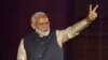 Indian Prime Minister Narendra Modi gestures toward his supporters after the election results at Bharatiya Janata Party (BJP) headquarter in New Delhi, India, May 23, 2019.