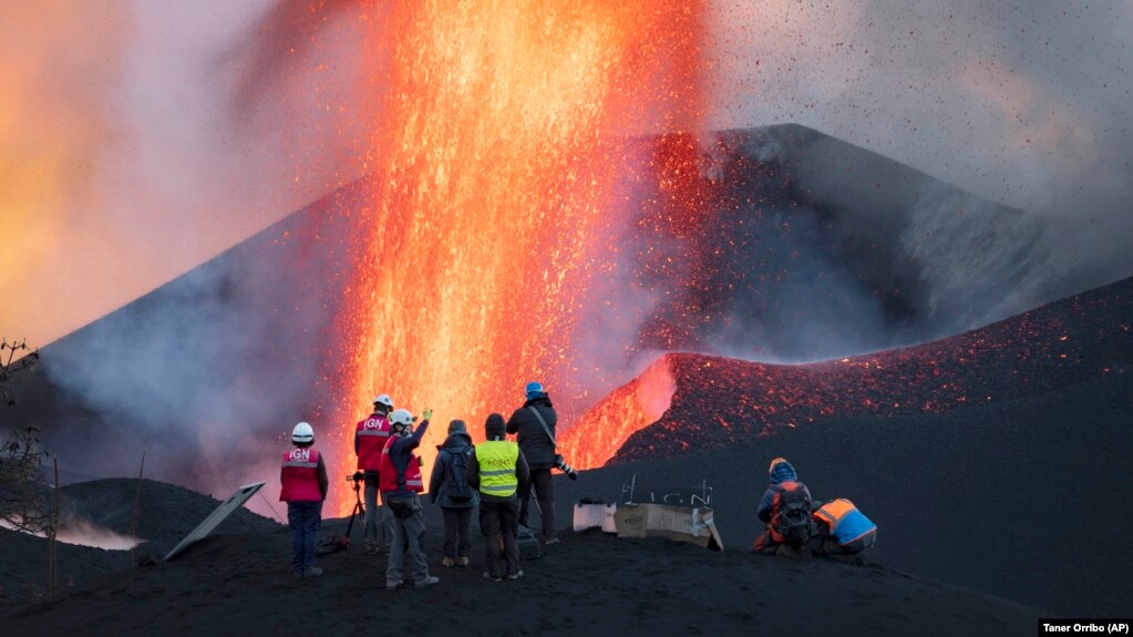 Scientists from CSIC (Spanish National Research Council) take geophysics measurements on the Canary Island of La Palma, Spain, on November13, 2021. (AP Photo/Taner Orribo)