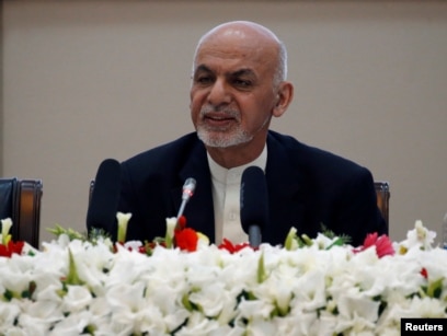 FILE - Afghan President Ashraf Ghani speaks during during a peace and security cooperation conference in Kabul, Afghanistan, Feb. 28, 2018.
