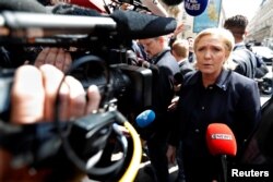 Marine Le Pen, French National Front political party leader and candidate for French 2017 presidential election, arrives at her campaign headquarters in Paris, April 28, 2017. Marcron will face off with Le Pen for the presidency during the final round of voting in France next Sunday.