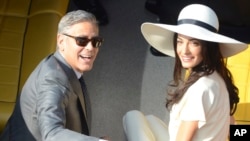 Джордж Клуни и Амаль Аламуддин. Венеция, Италия. 29 сентября 2014 г. 