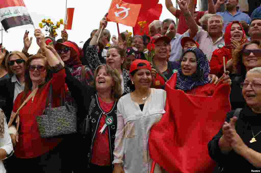 Supporters of the Iraqi Communist Party chant slogans during an International Worker&#39;s Day, or Labour Day, rally in Baghdad.