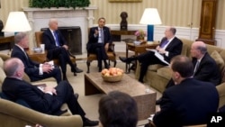 President Barack Obama discusses the situation in Egypt with Vice President Joe Biden and the national security team during the Presidential Daily Briefing in the Oval Office, Jan. 28, 2011.
