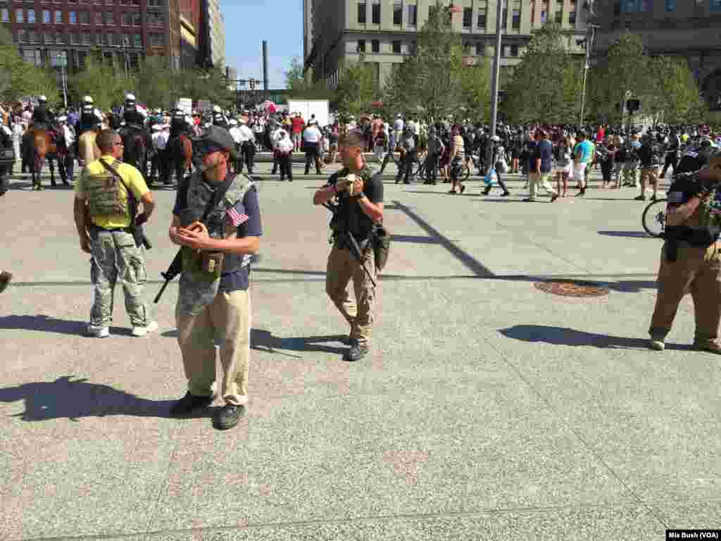 Ten Ohio Minutemen fanned out to the outer edged of a protest in Public Square when tensions rose between various protest groups, in Cleveland, July 19, 2016. One Minuteman said they were just there to make sure everyone stayed safe.