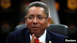 FILE - El Salvador's Attorney General Douglas Melendez speaks during an interview with Reuters in San Salvador, Oct. 10, 2018.