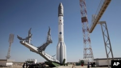 FILE - A Proton-M rocket, a Russian heavy lift launch vehicle, is installed at Baikonur launch pad in Kazakhstan, May 13, 2014.