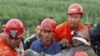 Chinese Coal Miners Rescued from Flooded Underground Pit