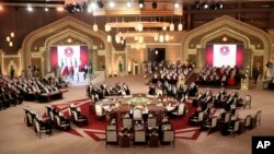 Gulf leaders meet during a Gulf Cooperation Council summit in Doha, Qatar, Dec. 9, 2014.