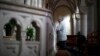 A woman prays at Sheshan Cathedral in the outskirts of Shanghai October 28, 2013. Picture taken on October 28, 2013