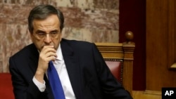 Greece's Prime Minister Antonis Samaras attends the first round of voting to elect a new Greek president at the Parliament in Athens, Dec. 17, 2014.