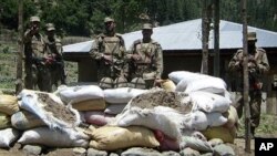 Soldiers near a checkpoint which was attacked by militants in Upper Dir, along Pakistan's border with Afghanistan (File Photo - June 3, 2011).