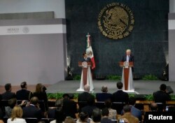 U.S. Republican presidential nominee Donald Trump and Mexico's President Enrique Pena Nieto give a press conference at the Los Pinos residence in Mexico City, Mexico, Aug. 31, 2016.