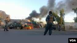 Smoke rises after an attack on a Red Cross office in the eastern city of Jalalabad, Afghanistan. (Z. Hasrat/VOA)