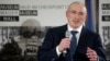 FILE - Russian former oil tycoon Mikhail Khodorkovsky speaks during a news conference in the Museum Haus am Checkpoint Charlie in Berlin, December 2013. 