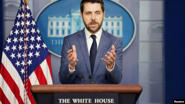 FILE- White House national economic director Brian Deese speaks during a press briefing at the White House in Washington.