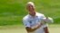 Jim Furyk celebrates after shooting a course and PGA-record 58 during the final round of the Travelers Championship golf tournament in Cromwell, Conn., Sunday, Aug. 7, 2016.